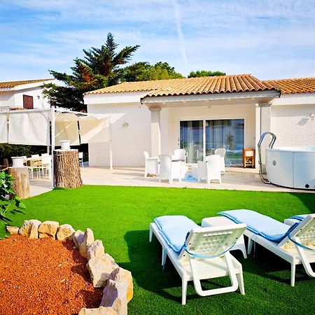Ikebana Villas Porto Pino Beach Exterior photo
