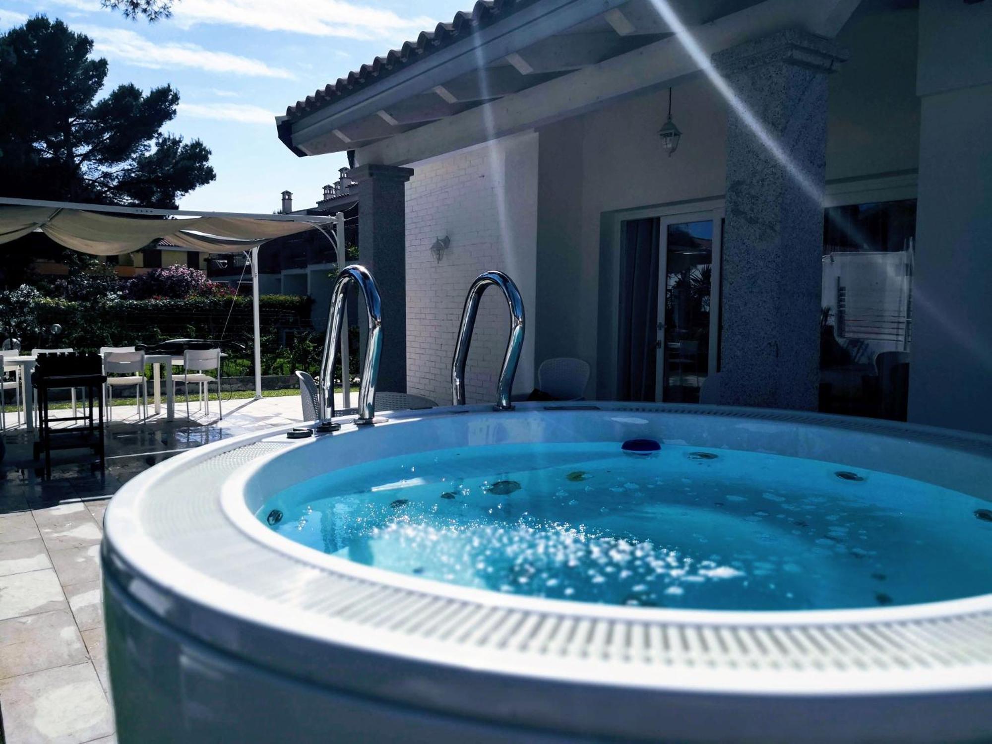 Ikebana Villas Porto Pino Beach Exterior photo
